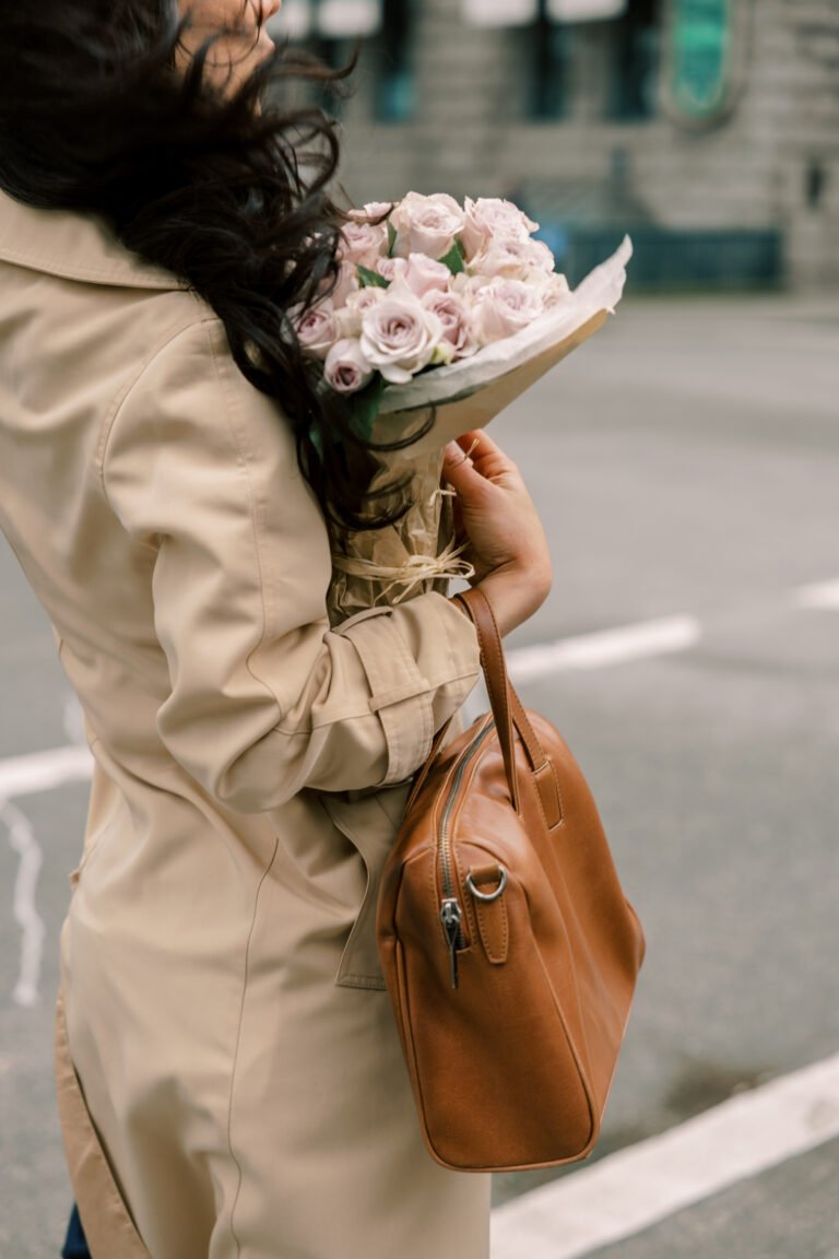 Woman in spring flowers experiencing allergy and hormone imbalance symptoms in Garner Iowa